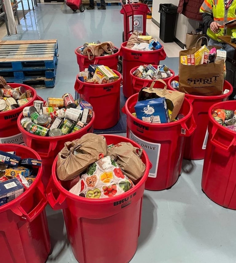 Barrels of food waiting to be weighed in the Food Bank of Alaska warehouse